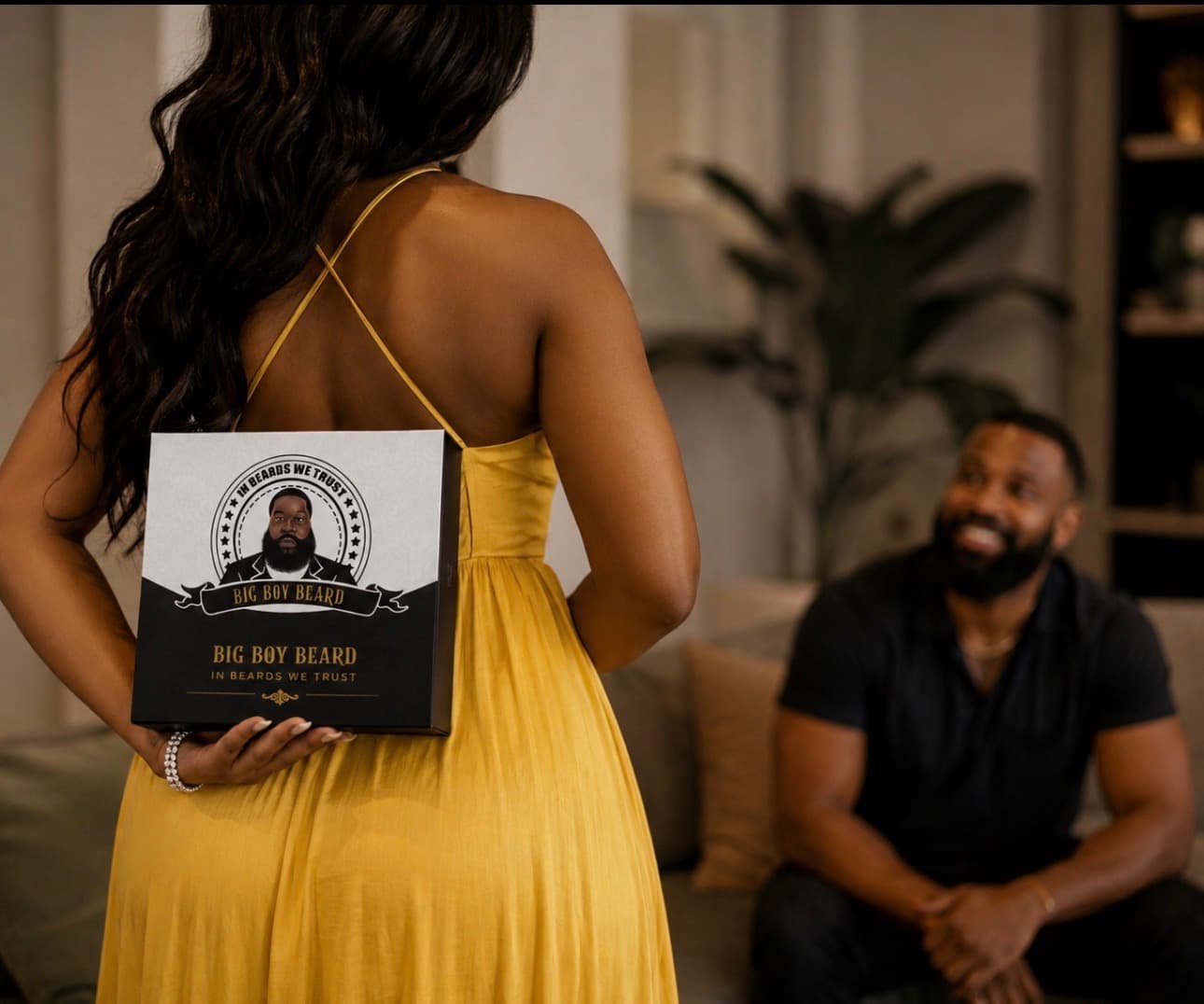 A woman in a yellow dress holding a Big Boy Beard gift box behind her back